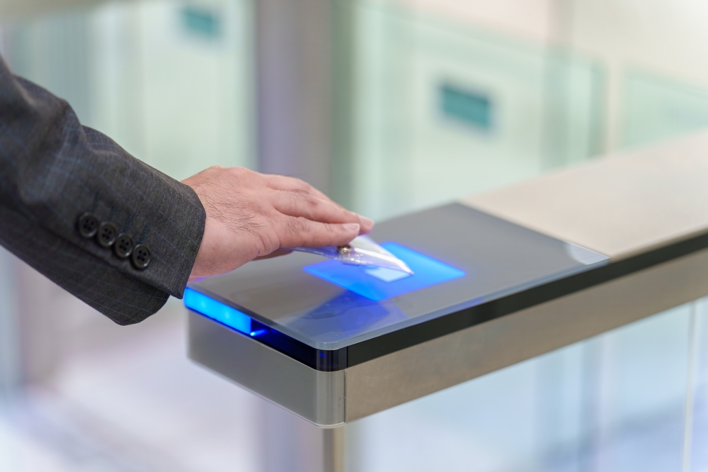 Closeup,Of,Hand,Of,Business,Person,Using,Security,Gate